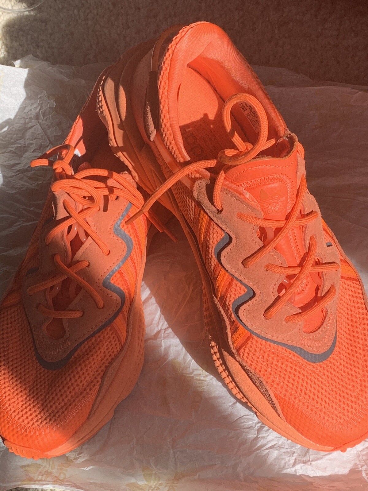orange ozweego size 5