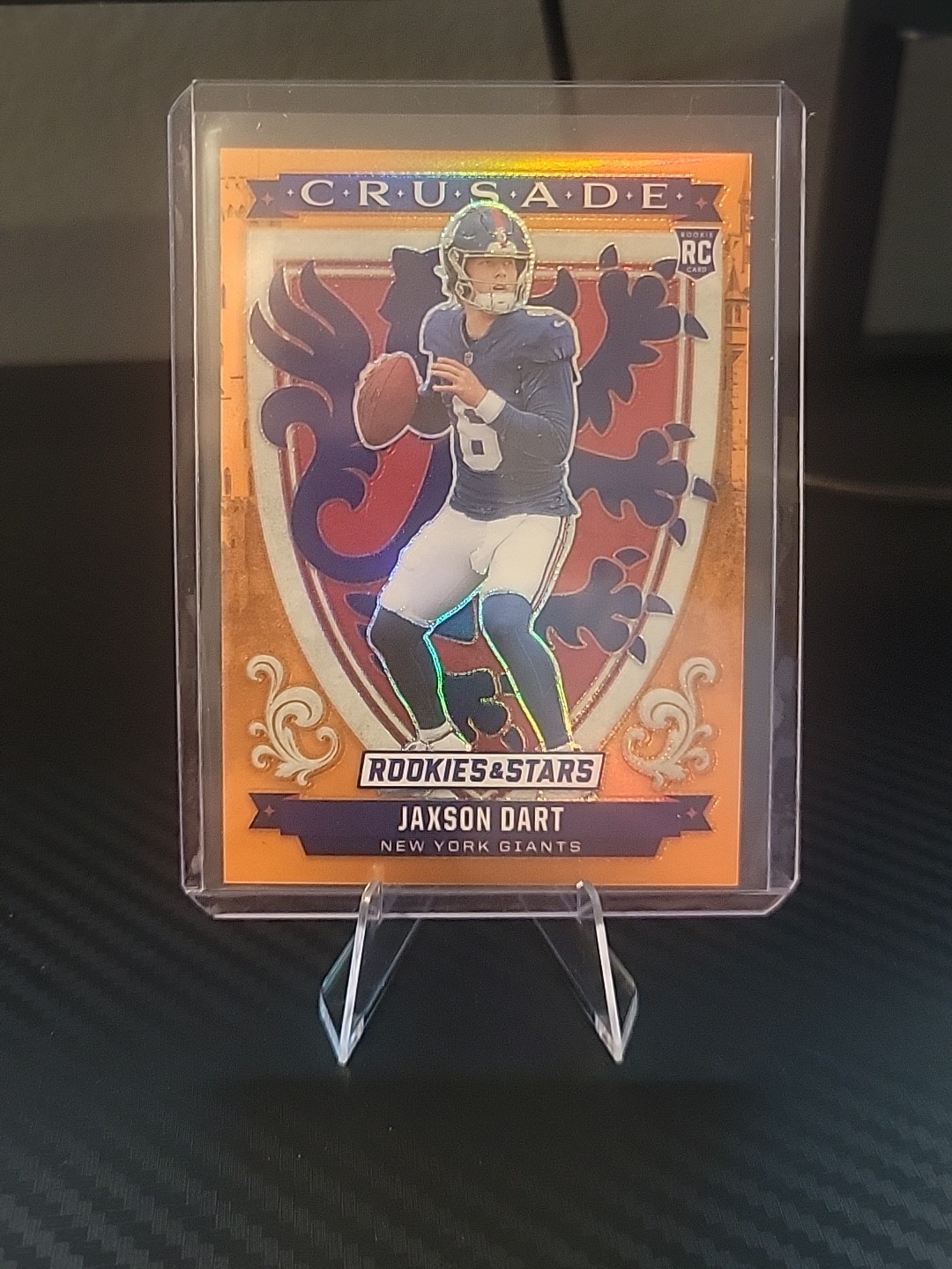 2025 Rookies and Stars Orange Crusade /25 Jaxson Dart No.11