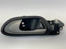 Honda Civic 2006-2011 sedán puerta trasera izquierda puerta trasera interior manija de puerta OEM