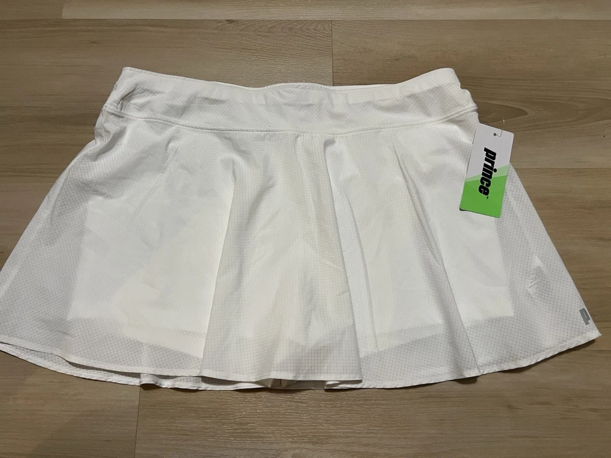Haut de tennis en molleton Court Dri-FIT Heritage pour femme. CH