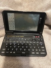 Vintage Sharp Wizard 256KB OZ-9600 Electronic Organizer.