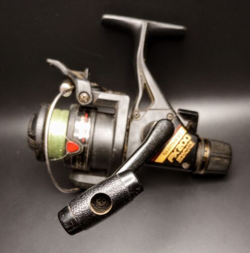 Vintage  Shimano FX 200 Spinning Fishing Reel Graphite Japan Quickfire 2  - Picture 1 of 5