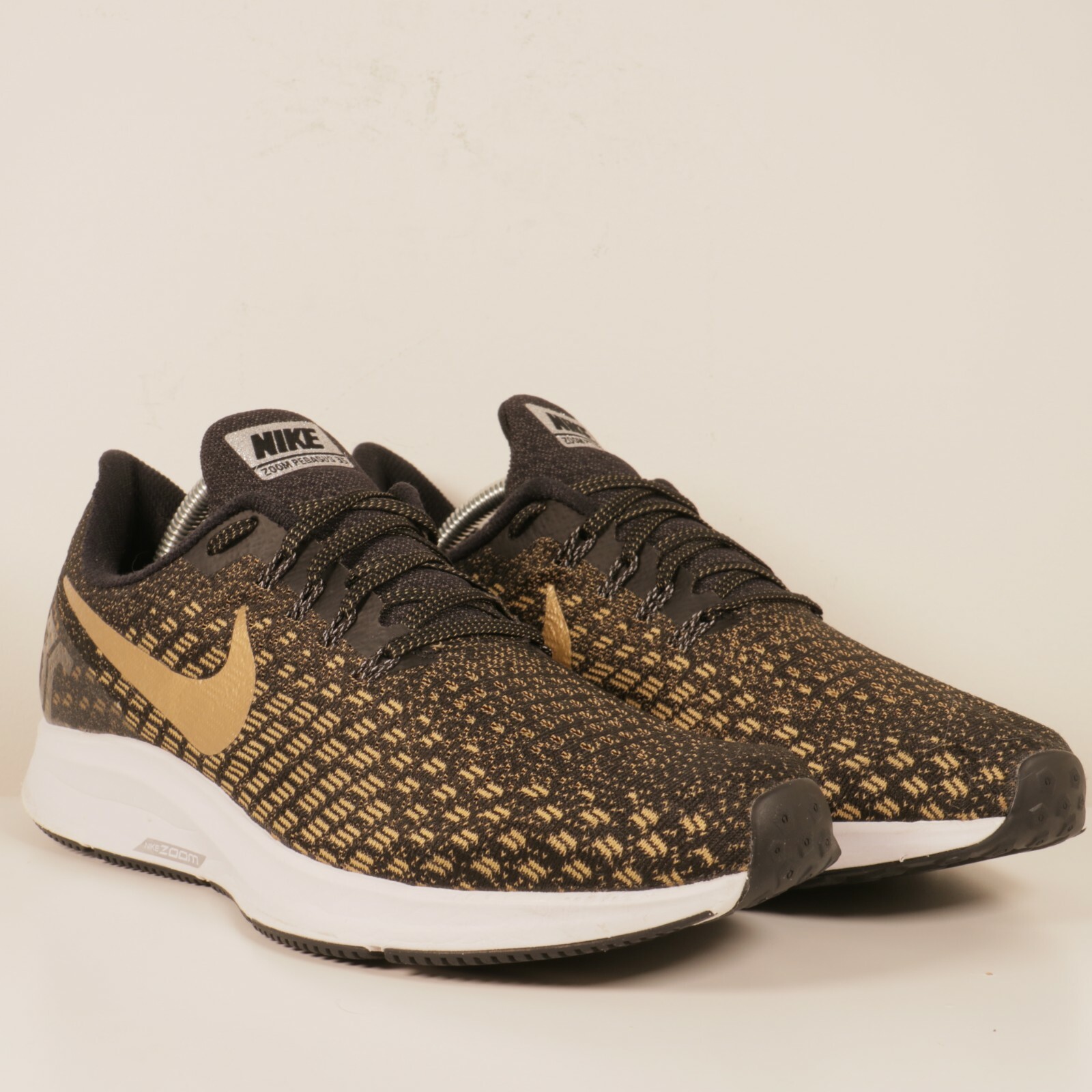 nike air zoom pegasus 33 black and gold
