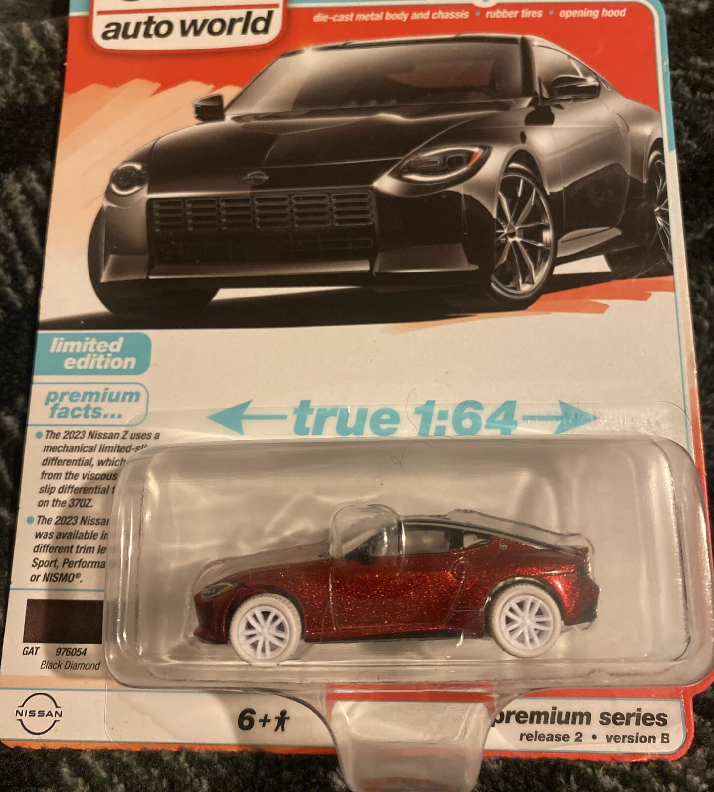 2023 Nissan Z Ultra Red Chase 1/64 Diecast Car by Auto World Import Legends