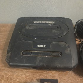 Sega genesis with 2 games and performance gamepad