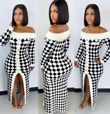 Womens casual Black / White sweater dress with split.  Runs Big Size 2x 