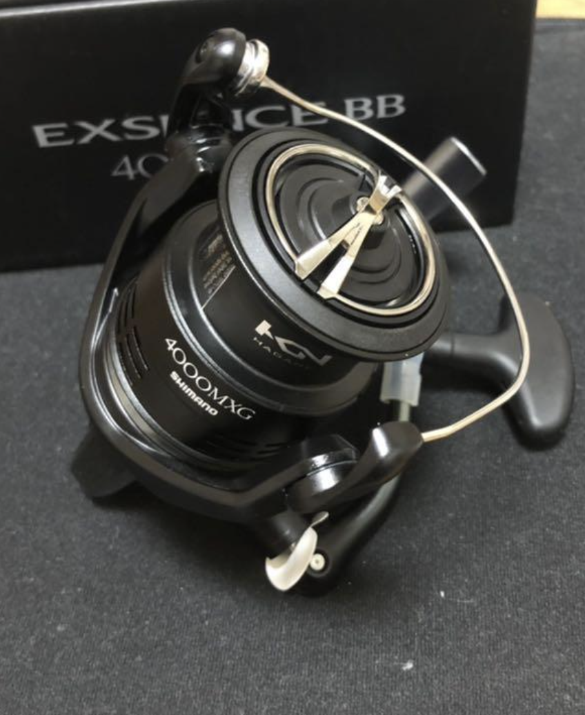 Shimano 20 Exsence BB 4000MXG Right Handle Spinning Reel in the
