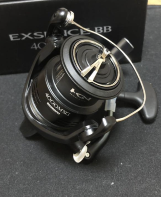Shimano 20 Exsence BB 4000MXG Right Handle Spinning Reel in the