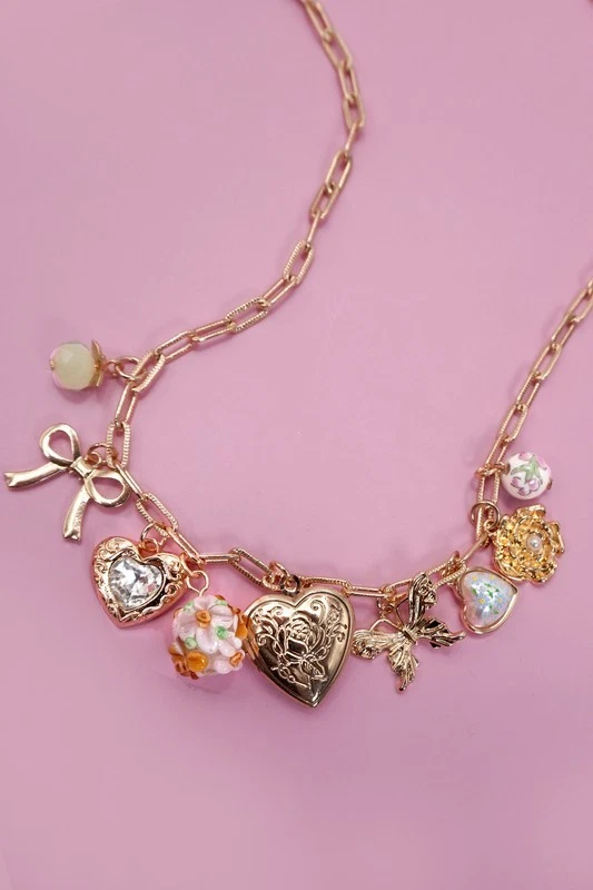 Collar con dije enchapado en oro - Medallón corazón, arco, mariposa, flor, diamantes de imitación Foto 3 de 4