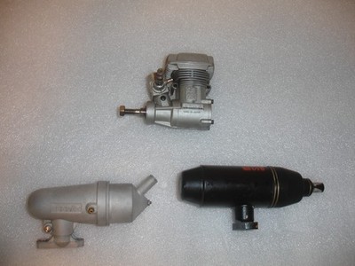 O.S. Max 32SX RC helicopter engine starts and runs great comes with one muffler