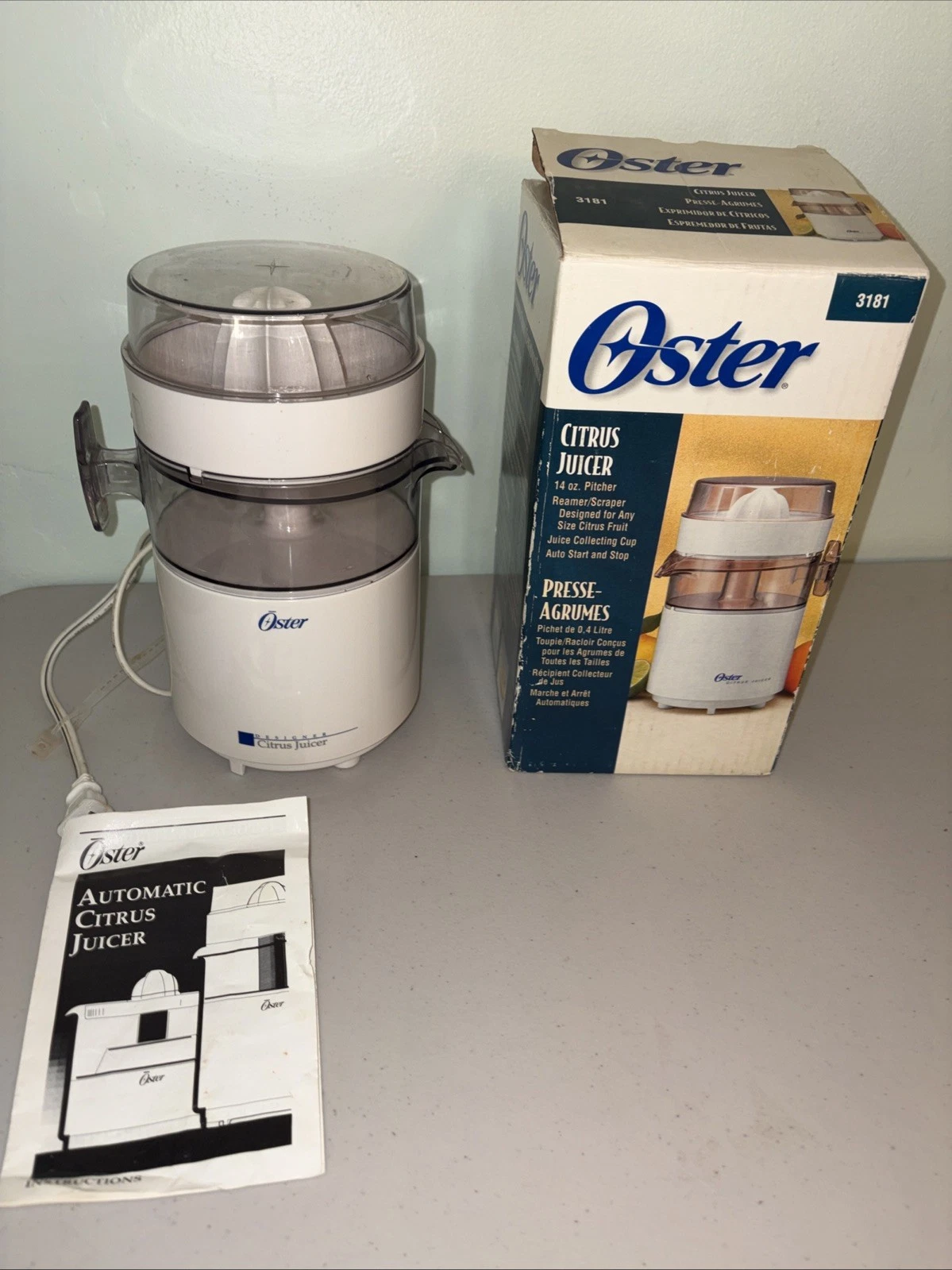 Oster automatic electric citrus Juicer Tall 14oz container & juicing tray