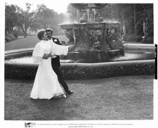 Lucille Ball dancing with Robert Preston in front of fountain from- Old Photo