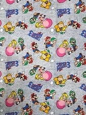 Nintendo Fabric Go Super Mario and Friends CP73421 Cotton Quilting Gamer Kids