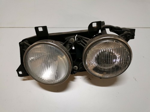 BMW E32 7er Serie Scheinwerfer links 13174100 740I