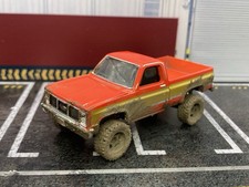 1987 GMC Sierra K1500 Lifted 4x4 Muddy Custom 1/64 Diecast Mud Truck Greenlight