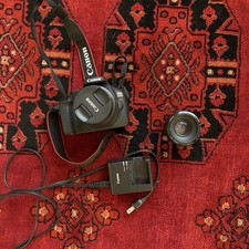 Canon EOS Rebel T7 18-55mm DSLR Camera Bundle, 2 Lenses, And Charger Included