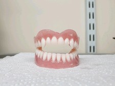Full Upper and Lower Vampire Dentures