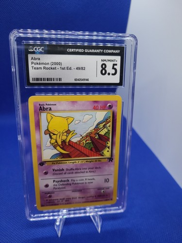 Pokemon 2000 Team Rocket 1st Edition Abra CGC 8.5 49/82