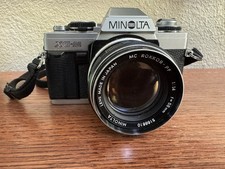 Vintage Minolta XG-M with flash, multiple lenses and case.