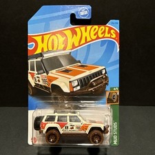 2023 Hot Wheels Treasure Hunt 95 Jeep Cherokee Mud Studs 176250