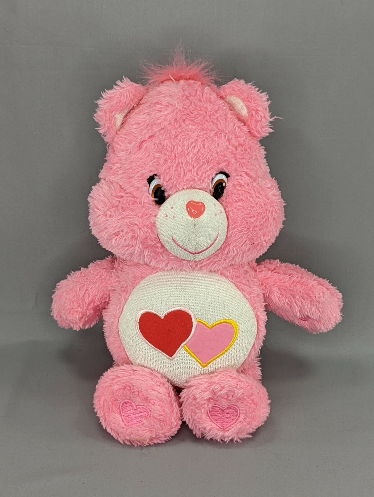 pink glow in the dark care bear