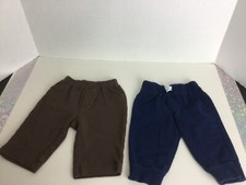 LOT OF 2 CARTERS BABY PANTS    6 MONTHS