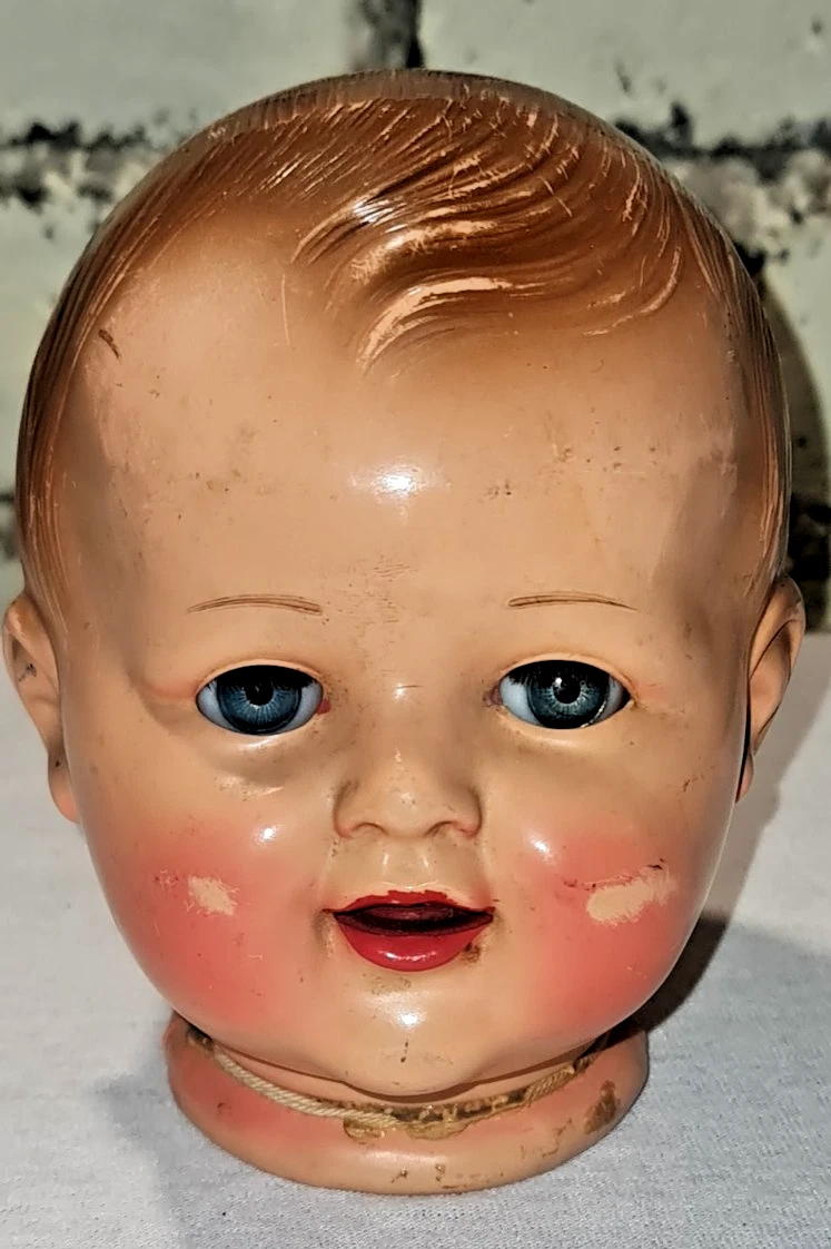 yeux riboulants,poupée ancienne,balancier