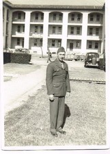 2 WWII Photos GI In Uniform Standing Outside With Barracks In The Background