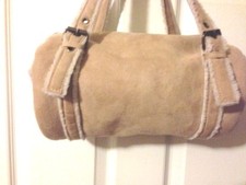 Tan Handbag With Buckles and Furry Inside