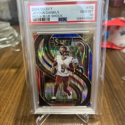 2024 Select - Premier Level Jayden Daniels Red & Blue Shock Prizm (RC) PSA 10