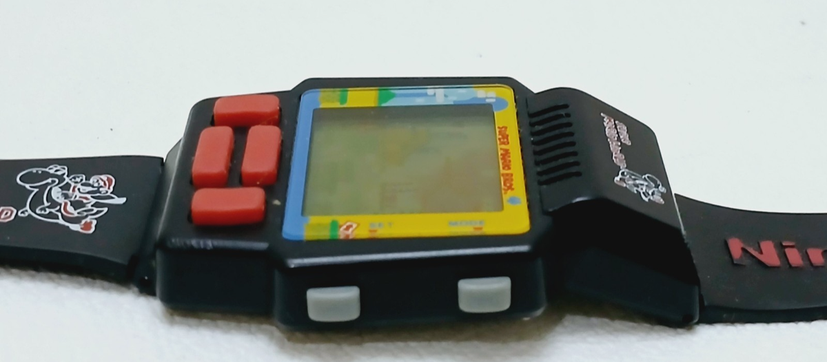 VINTAGE Nintendo Super Mario World game watch 1991 - Not working