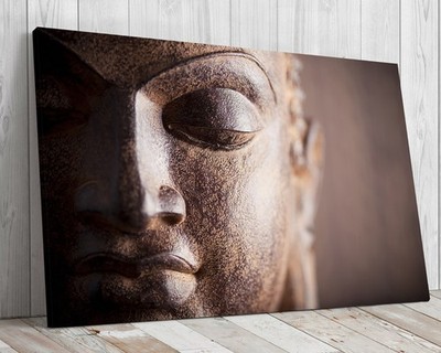 Buddha Gesicht, Nahaufnahme, aufgezogenes Leinwandbild fertig zum Aufhängen