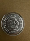 One Troy Ounce Pure AG .999 Silver Bullet Silver Shield Round, In Capsule