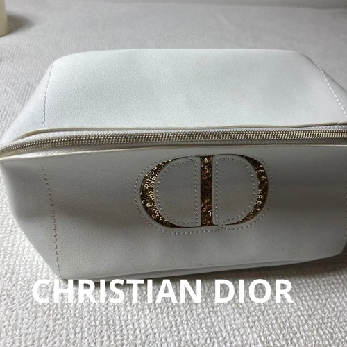 Pochette Christian Dior nouveauté édition limitée breloque étoile blanche occasion