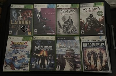 8 Xbox Game Lot - Mercs, Sonic, Hitman, Myst III, Mass Effect, Creed, LA Noire
