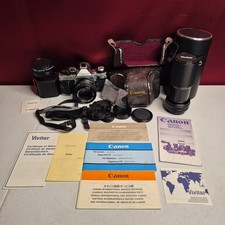 Canon AE  1 Program 35mm Film Camera w/ Canon FD f/1.4 Lens  Accessories Kit