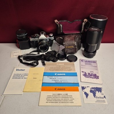Canon AE1 Program 35mm Film Camera with Canon FD f 1.4 Lens Accessories Kit
