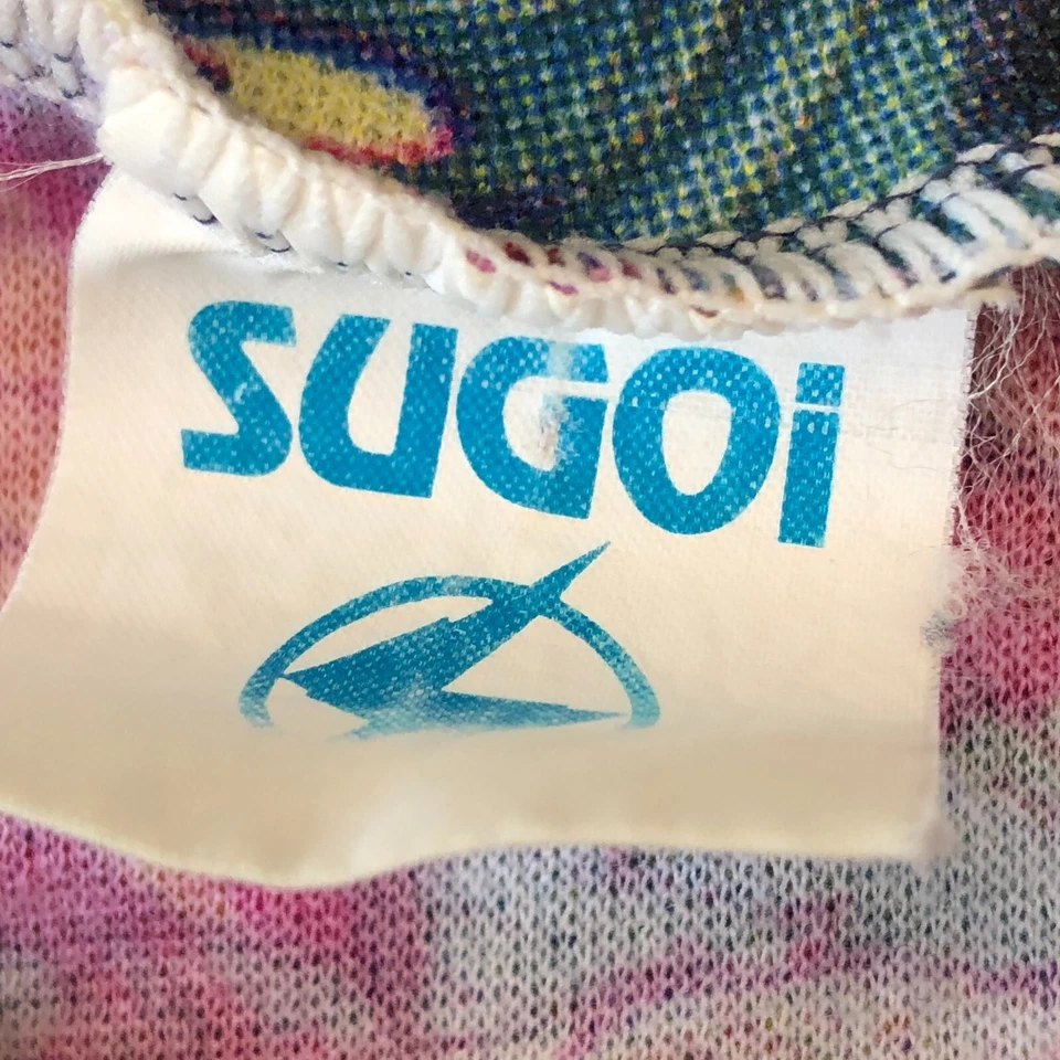 Camiseta deportiva de ciclismo Sugoi vintage años 90 talla L AOP estampado completo rara Foto 2 de 4