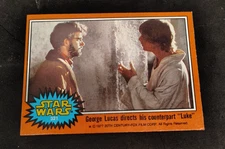 1977 Topps Star Wars Series 5 #321 George Lucas directs his counterpart Luke