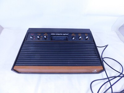 Atari CX-2600U Woody Videospielkonsole ~ ohne Stromkabel ~ ungetestet