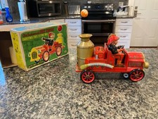 VINTAGE TIN MASUDAYA TOYS CO LTD B/O OLD FASHIONED FIRE ENGINE W/LEVITATING BALL