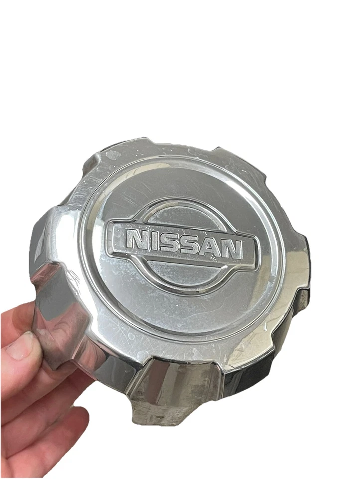 (1) Tapa central de rueda cromada Nissan Pathfinder 1999 2000 OEM 40315-2W320 Foto 2 de 4