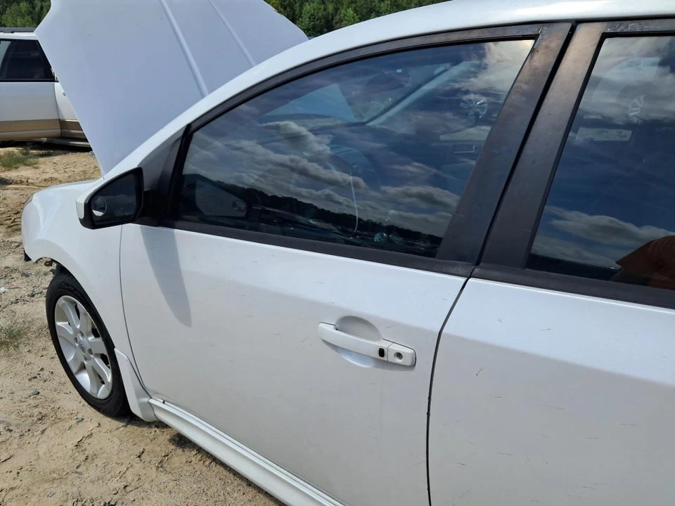 Puerta delantera del conductor eléctrica sin molduras laterales del cuerpo se adapta 07-12 SENTRA 2652760 Foto 2 de 4