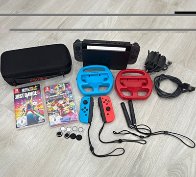 Nintendo Switch Handheld-Konsole 32GB grau Joy-Cons Tasche Netzteil Spiele