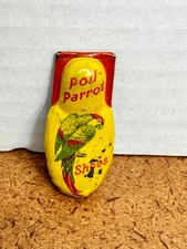 Vintage Poll Parrot Shoes Advertising Tin Toy Clicker