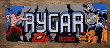 a Rygar Arcade 4x12 Metal Wall Video Game Sign