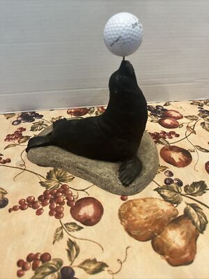 RARE VINTAGE SALTY SEAL TIM WOLFE SIGNED 1996 MADE IN USA HEAVY GOLF BALL STATUE