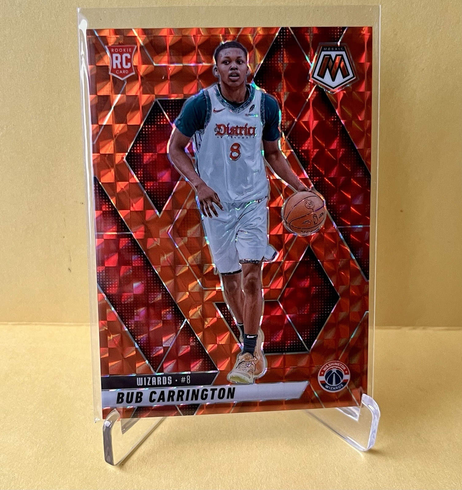 2024-25 Panini Mosaic #206 Bub Carrington Orange /249 (RC) Washington Wizards