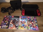 Nintendo Switch With 4 Games and a hard case