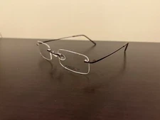 NEW Marchon Airlock 2 760 12 48 GLASSES FRAMES Titanium Rimless Copper 49-21-135